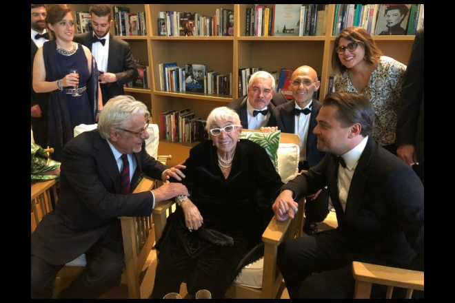 Giancarlo Giannini con Lina Wertmüller, Paolo Rossi Pisu, Marcello Foti e Leonardo Di Caprio. Foto da Ufficio Stampa