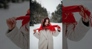 Donna con cappotto in inverno. Foto di Danik Prihodko