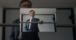Stefano Pesce è Luca Barbero in una scena di Photogame - Autoritratto di un'Ossessione